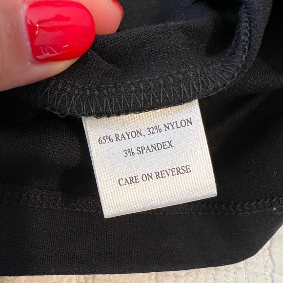 CHANEL - EXCELLENT Like NEW - Uniform Black 3/4 sleeve top with quilted CC Logo - Picture 6 of 7